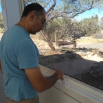 Robert David painting the Test Module at SAM, Biosphere 2