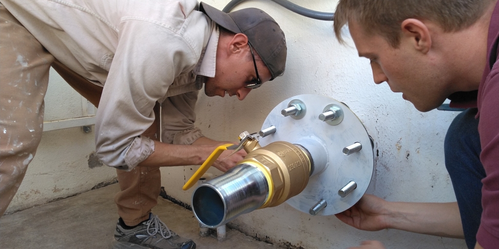 Trent Tresch, Sean Gellenbeck install a new inflation system for SAM at Biosphere 2