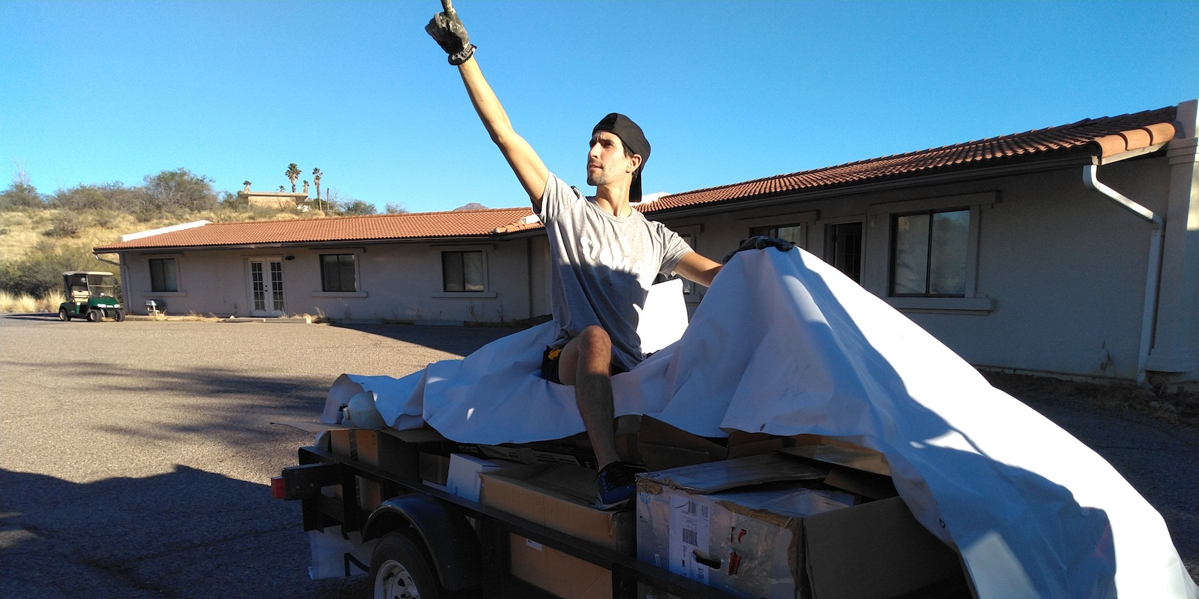 Trent rides the trailer to the dumpster!