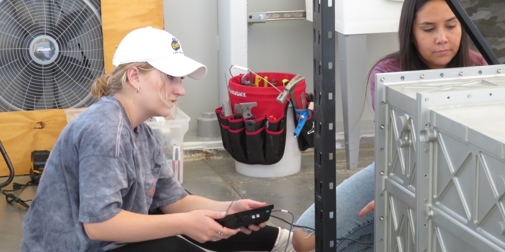 Grace, Brianna of the UA Engineering Capstone team conducting CO2 scrubber test at SAM, Biosphere 2