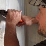 Nathan Schmit replacing more than 170 rivets in the future crew quarters of SAM at Biosphere 2