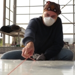 Luna snapping a chalk line at SAM, Biosphere 2