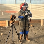Crew Cassie works with a 4x5 film camera on her EVA at SAM, Biosphere 2 - photo by Cassandra Klos (@cassandraklos)