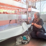 Crew Sheri tests the hydroponics at SAM, Biosphere 2 - photo by Cassandra Klos (@cassandraklos)
