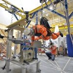 Astronaut Rex Walheim uses the Active Response Gravity Offload System (ARGOS), NASA JSC