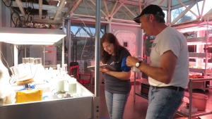 APUS ARG-1S Kristen Miller and Terry Trevino installing experiments at SAM