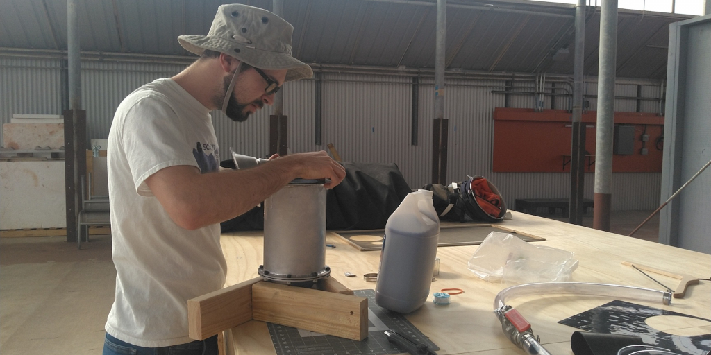 Griffin Hentzen building an early test rig for the 4-bed CO2 scrubber at SAM