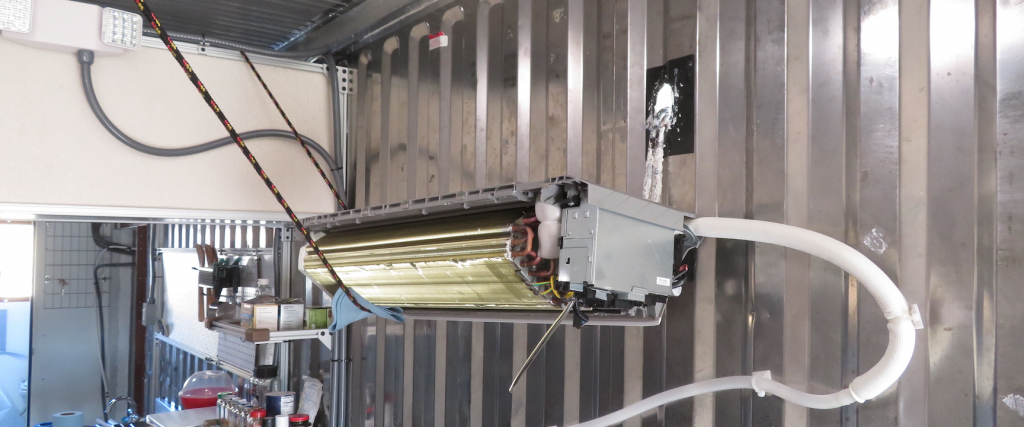 Removing the mini-split A/C unit in the SAM Crew Quarters to find leaks